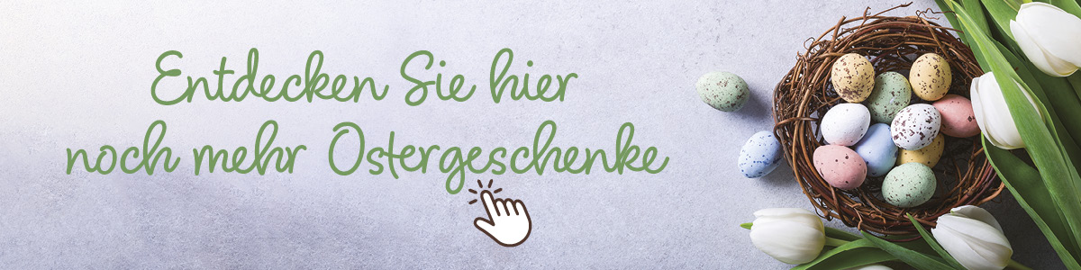 Banner mit bunten Ostereiern in einem Nest und weißen Tulpen. Text: "Entdecken Sie hier noch mehr Ostergeschenke".